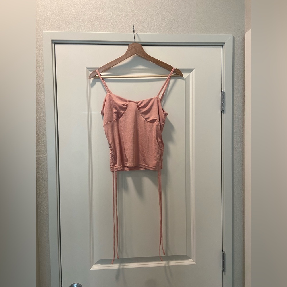 women’s pink tank top with ties on side, adjustable straps